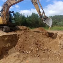 Pond excavation with heavy equipment in Grey County Ontario